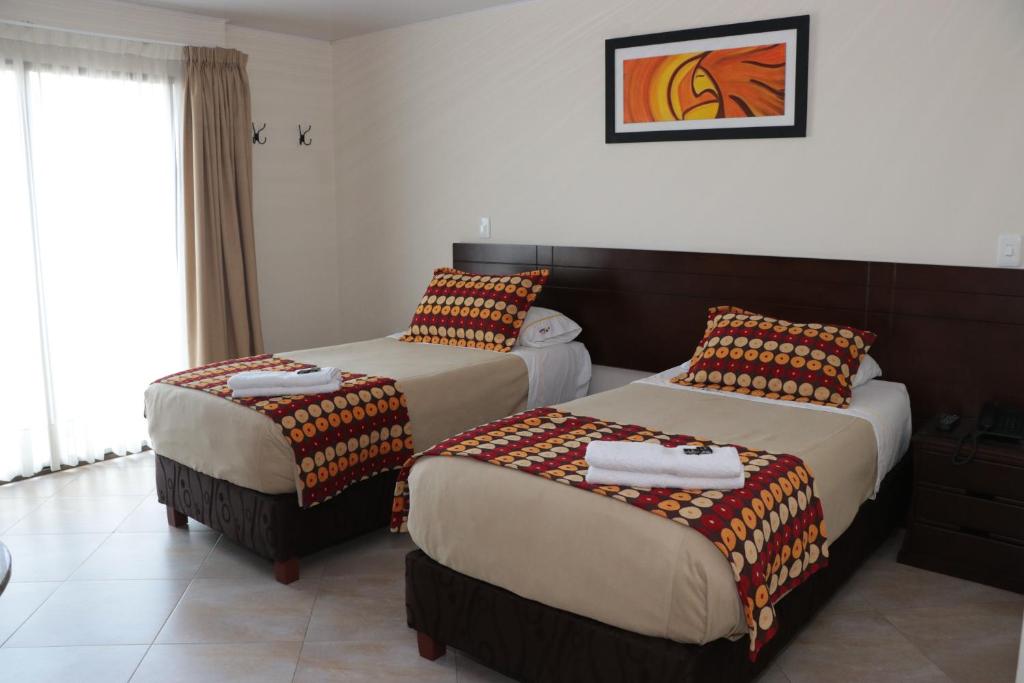 Postel nebo postele na pokoji v ubytování Hotel Castellana Group