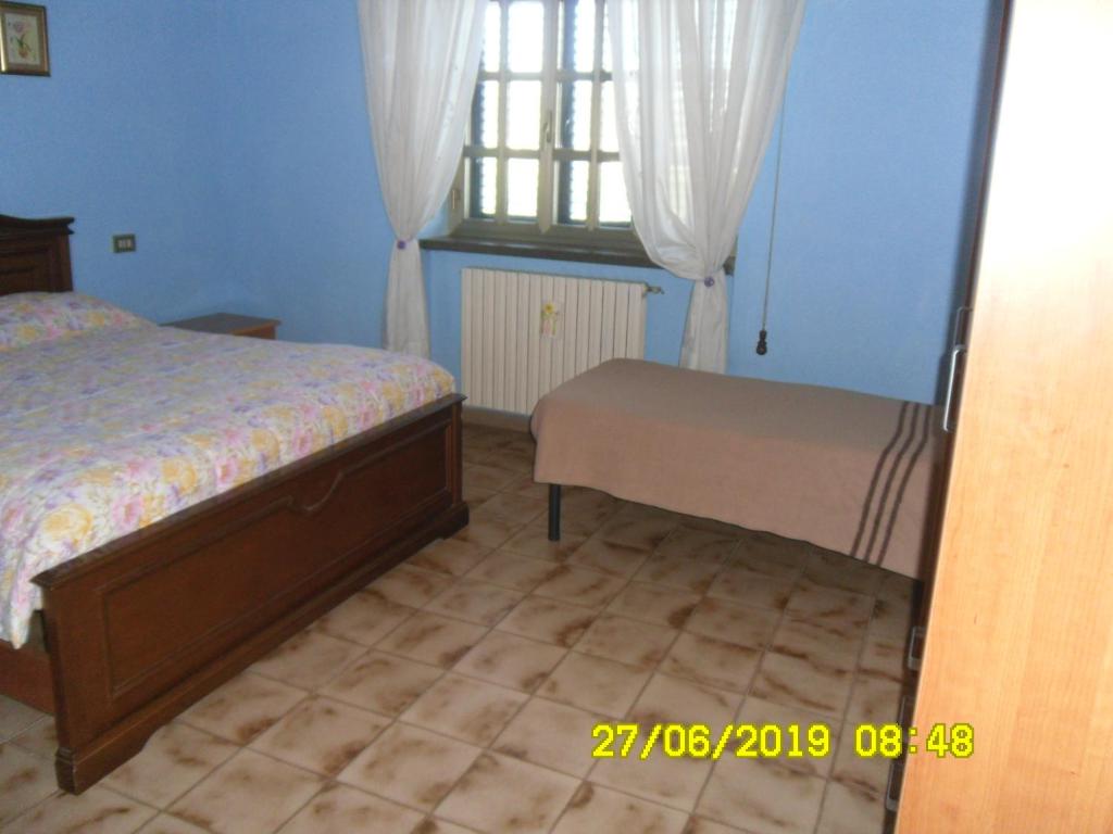 Postel nebo postele na pokoji v ubytování Bed and Breakfast Emilia