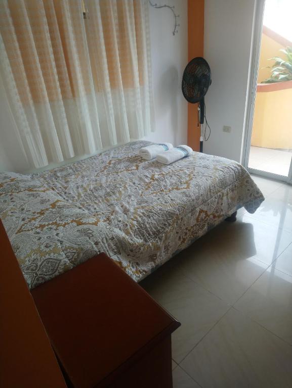Postel nebo postele na pokoji v ubytování Hostal Terito
