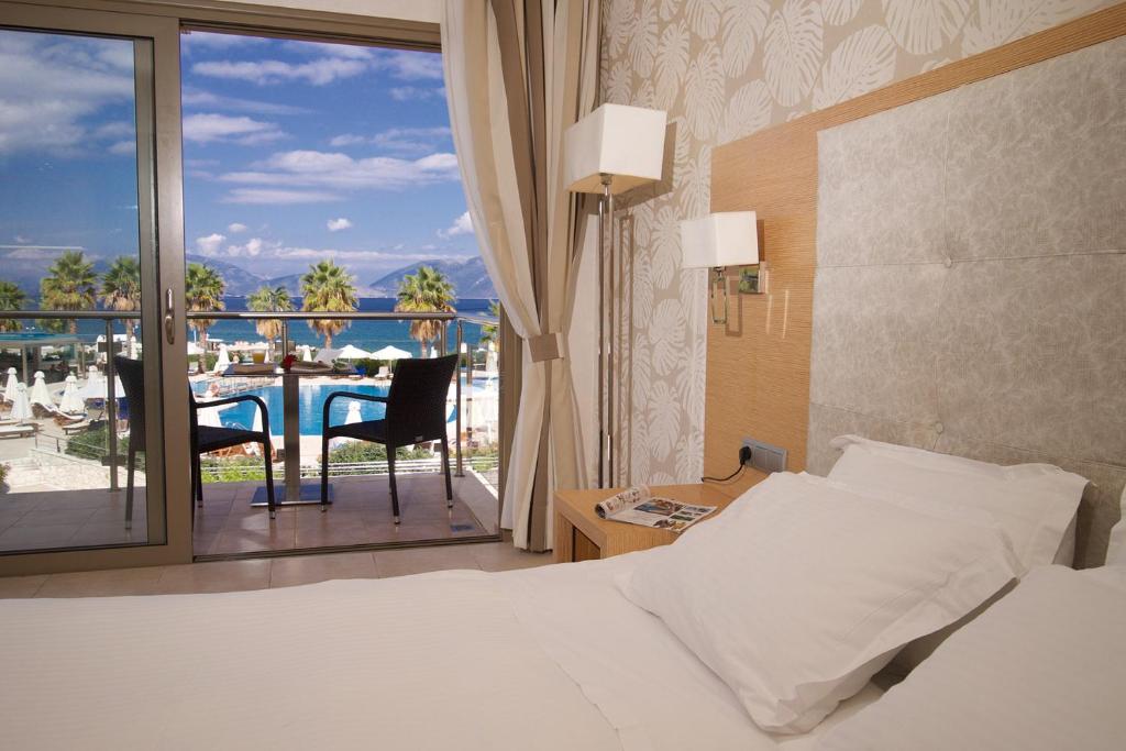 Postel nebo postele na pokoji v ubytování Ionian Emerald Resort