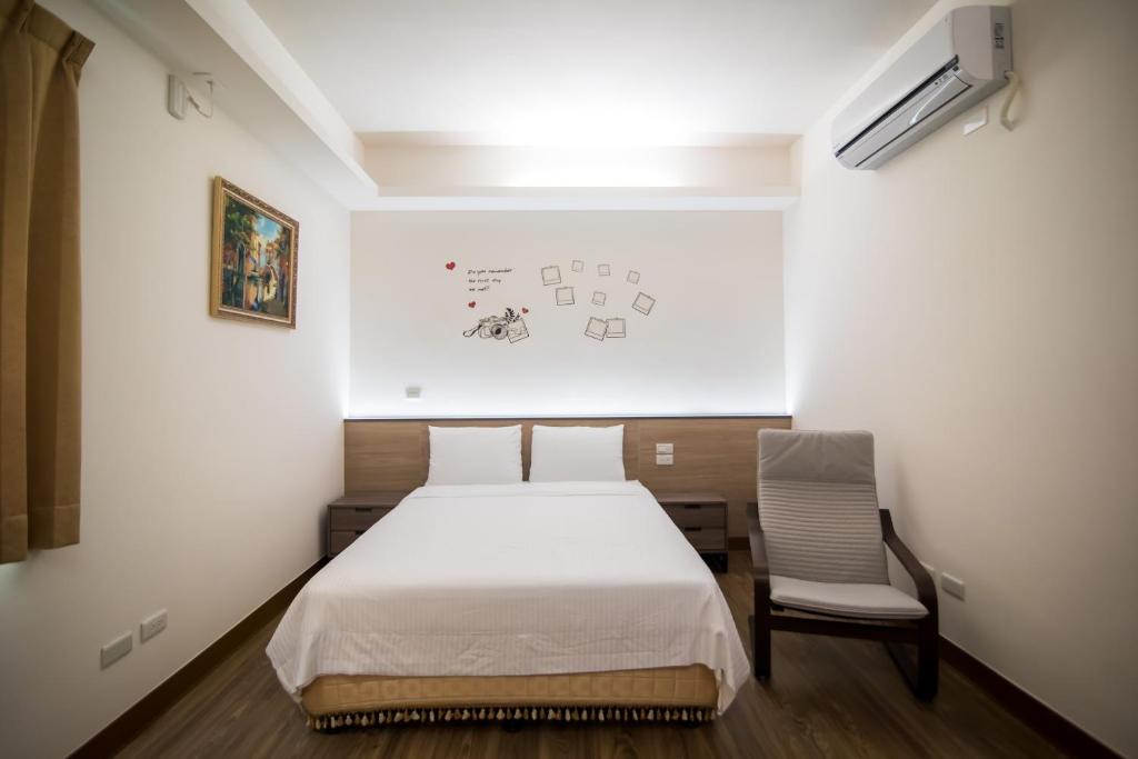 Postel nebo postele na pokoji v ubytování MuXia Fengqing Homestay
