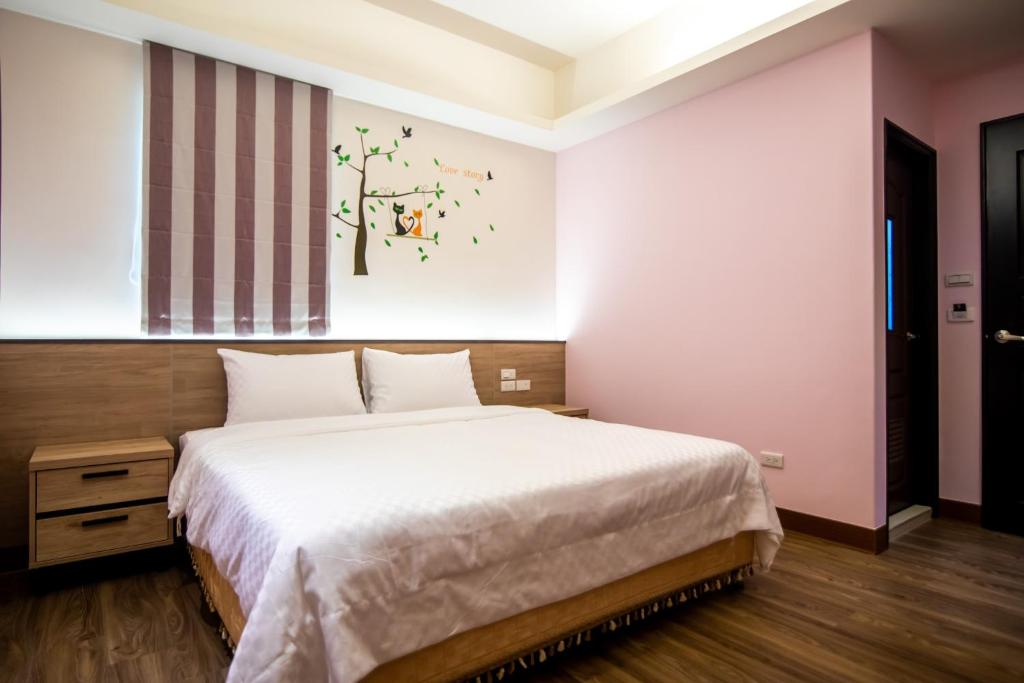 Postel nebo postele na pokoji v ubytování MuXia Fengqing Homestay