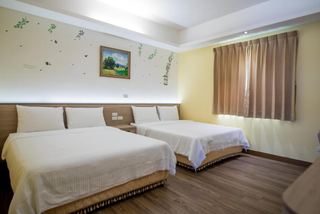Postel nebo postele na pokoji v ubytování MuXia Fengqing Homestay