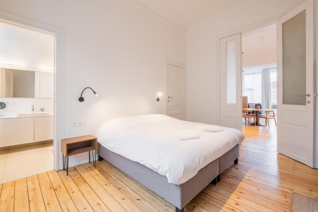 מיטה או מיטות בחדר ב-Savoie