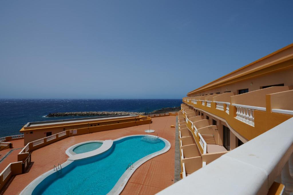 a view of a swimming pool on a cruise ship at ABLANCAS - La Restinga in La Restinga