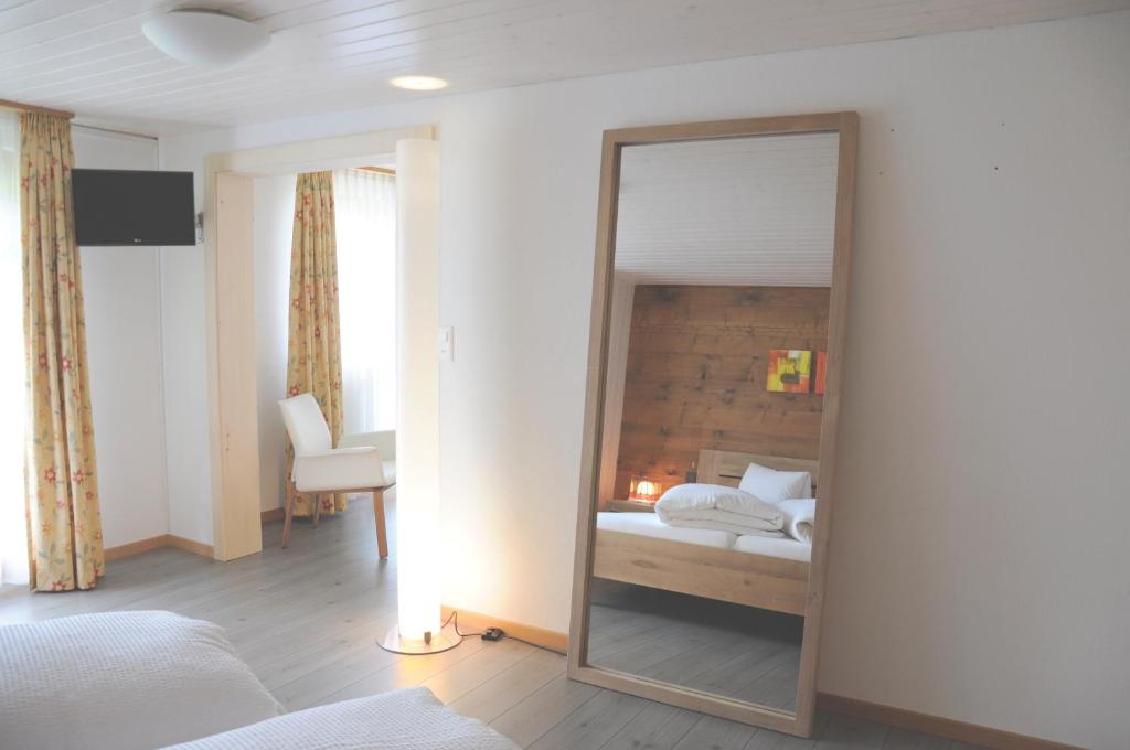 Postel nebo postele na pokoji v ubytování Hotel Tenne
