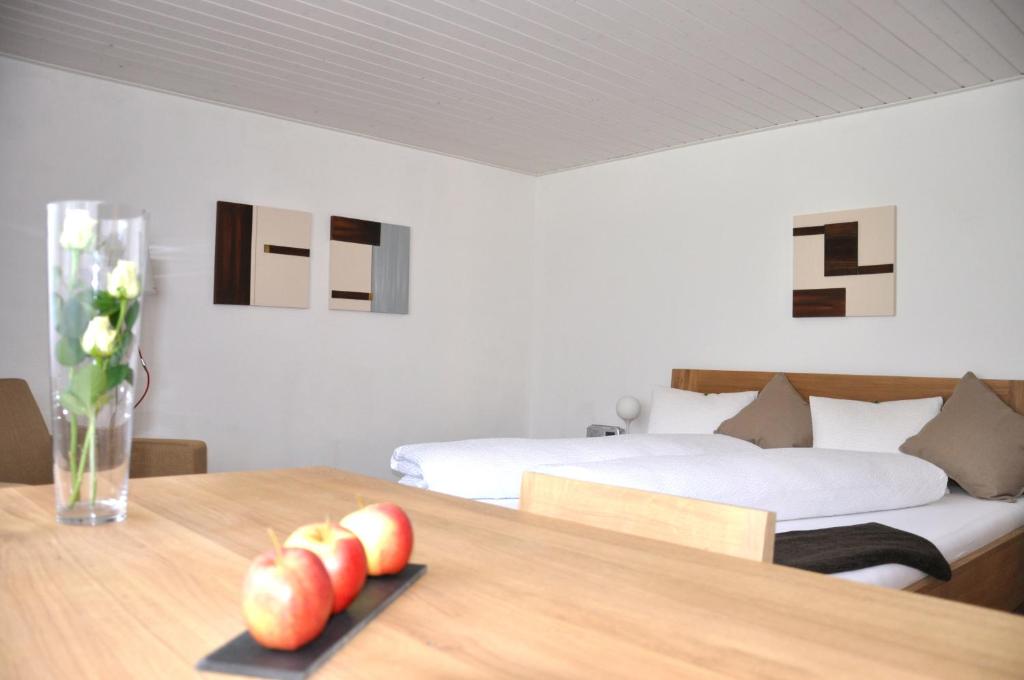 Postel nebo postele na pokoji v ubytování Hotel Tenne