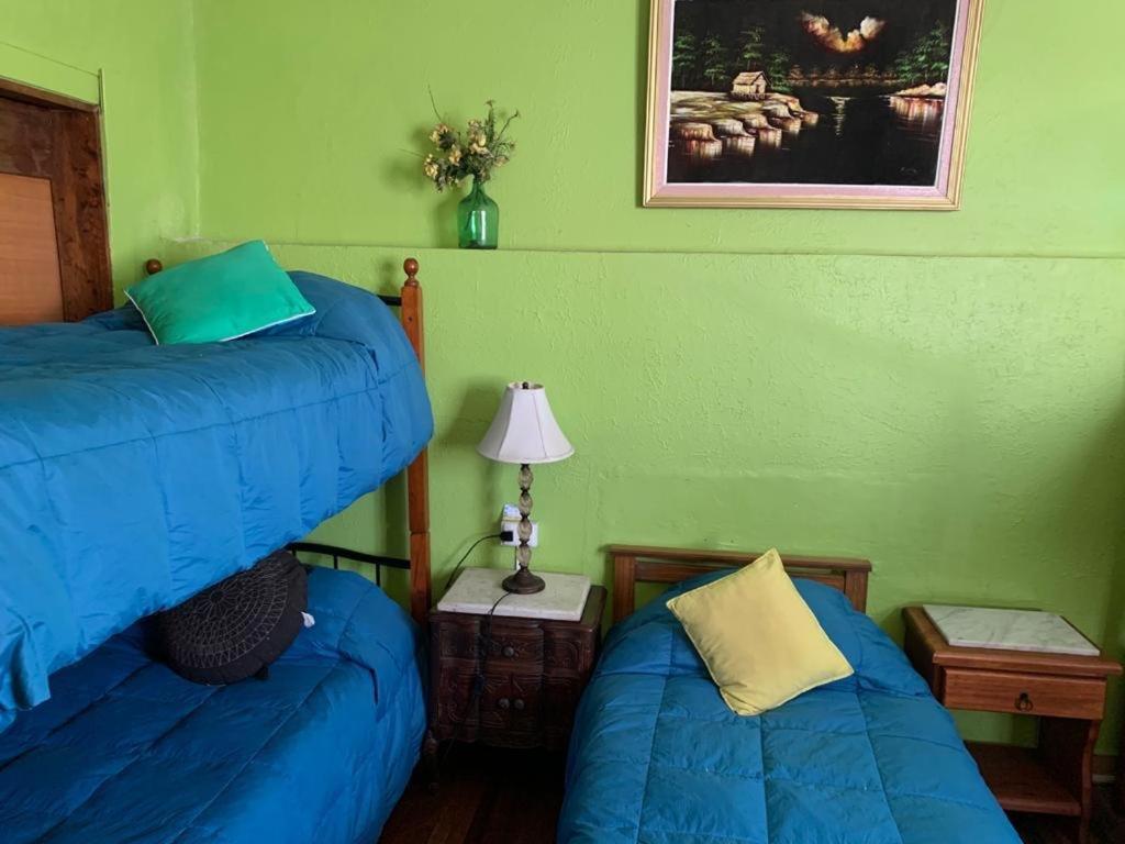 Postel nebo postele na pokoji v ubytování Residencial Campo Verde