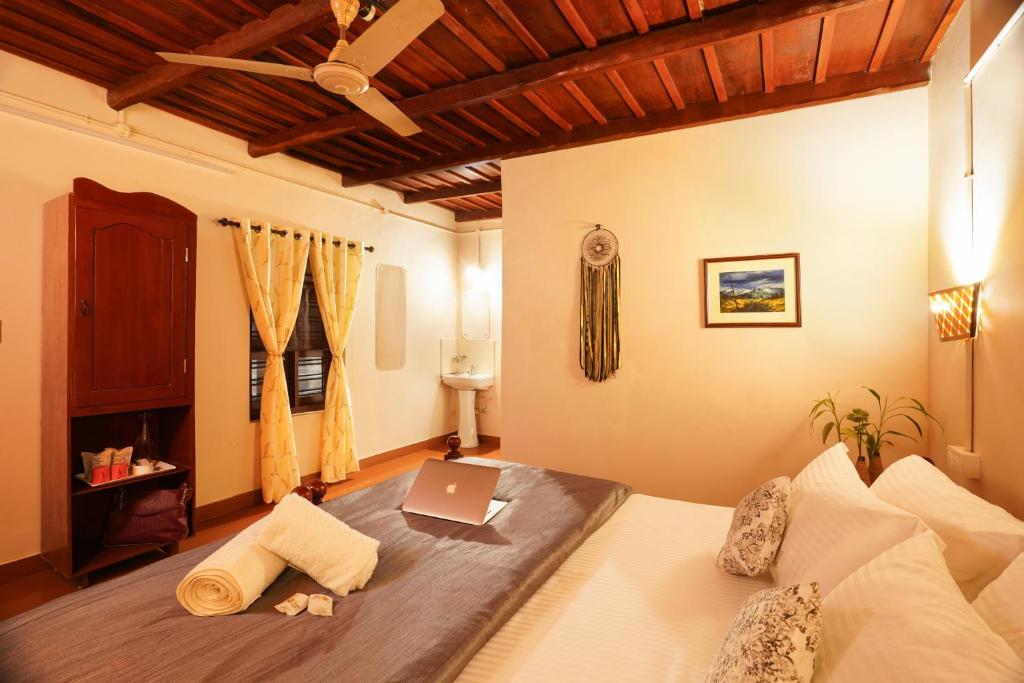 Postel nebo postele na pokoji v ubytování Zostel Homes Wayanad, Thirunelly