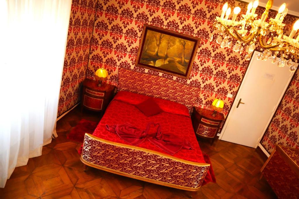 Postel nebo postele na pokoji v ubytování Venice Rainbow Apartment San Marco
