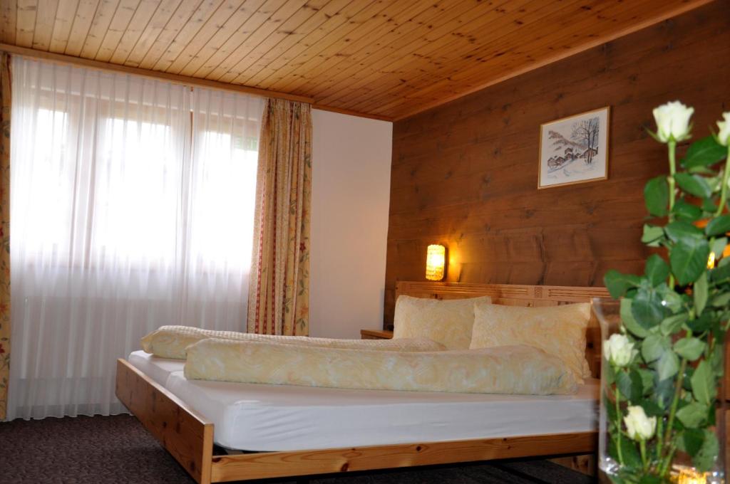 Postel nebo postele na pokoji v ubytování Hotel Tenne
