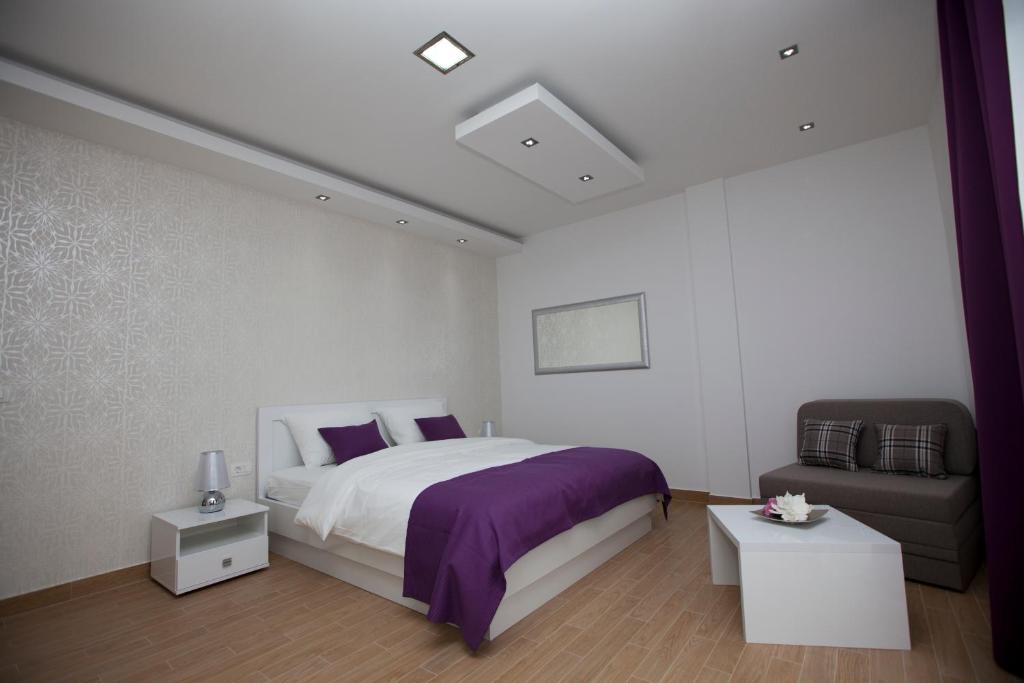 Postel nebo postele na pokoji v ubytování Rooms Ino