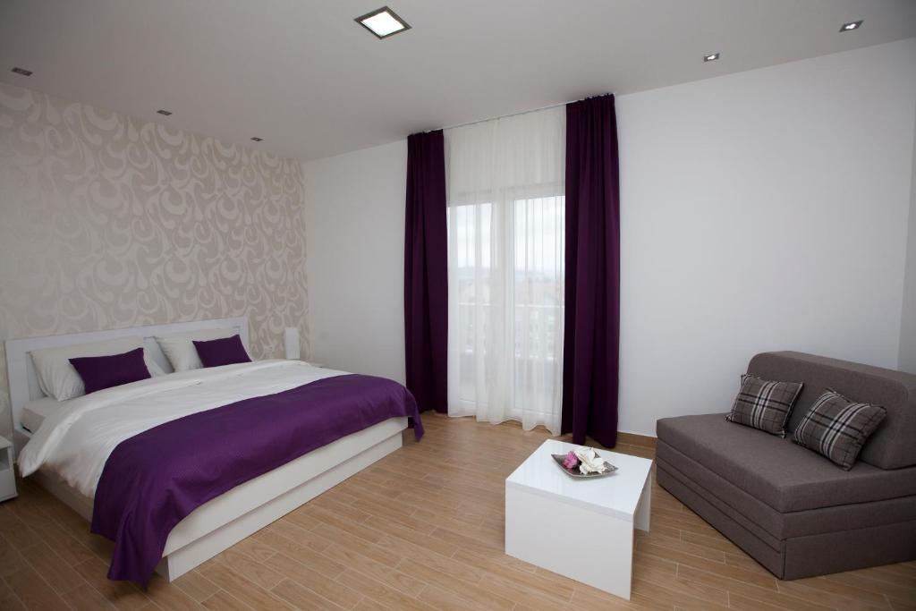 Postel nebo postele na pokoji v ubytování Rooms Ino