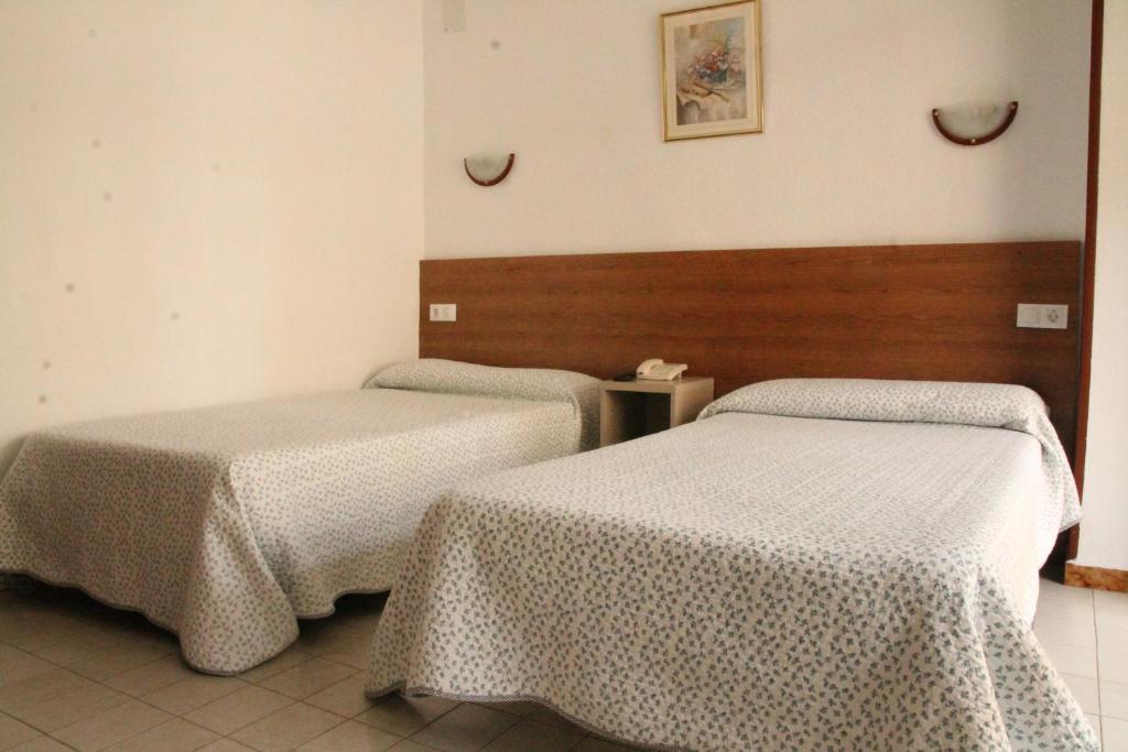 Postel nebo postele na pokoji v ubytování Pension Terminal