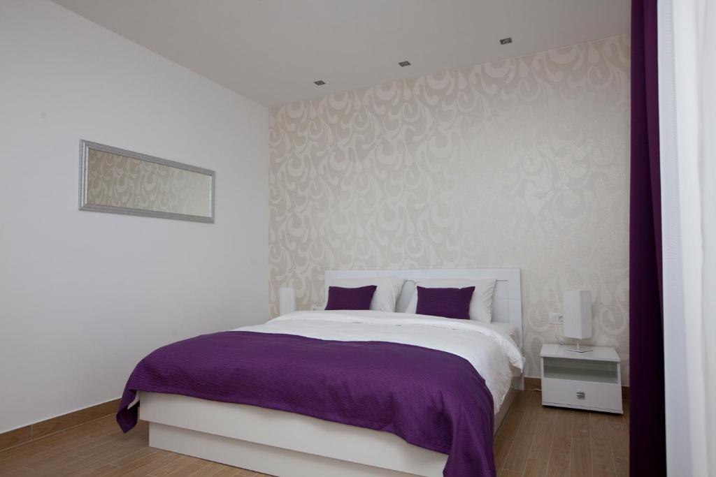 Postel nebo postele na pokoji v ubytování Rooms Ino