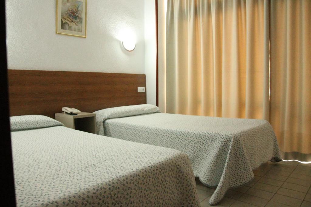 Postel nebo postele na pokoji v ubytování Pension Terminal
