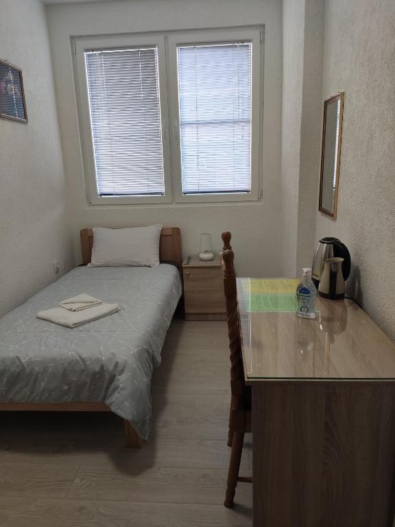 Postel nebo postele na pokoji v ubytování Villa Ivanovi
