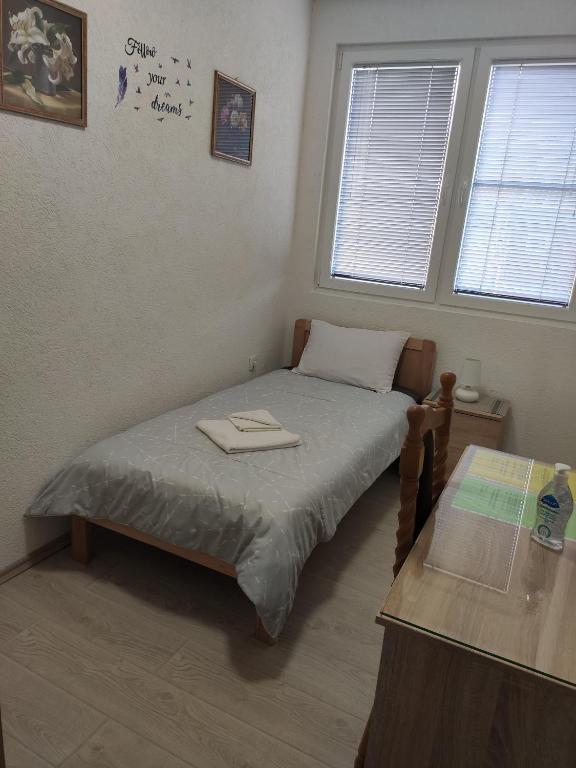 Postel nebo postele na pokoji v ubytování Villa Ivanovi