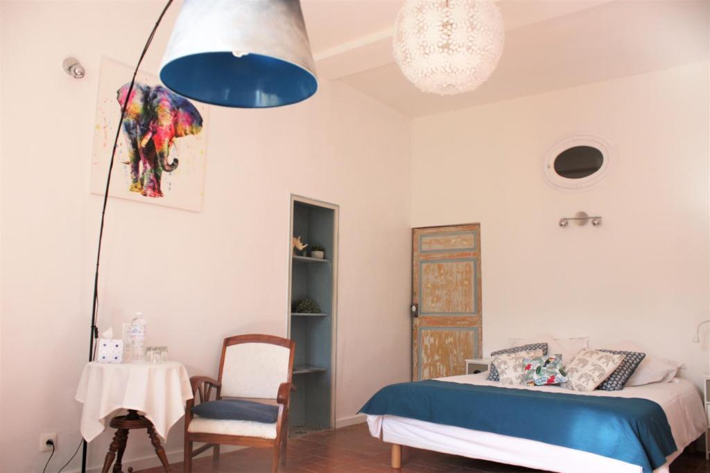 Postel nebo postele na pokoji v ubytování H2o Chambres d'Hôtes