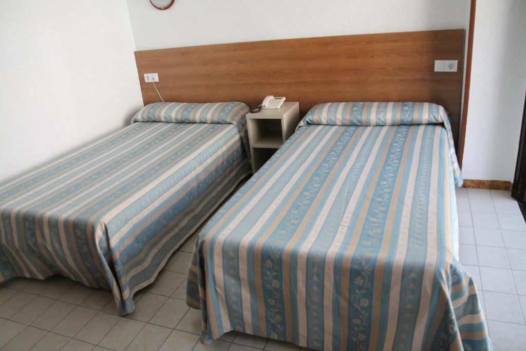 Postel nebo postele na pokoji v ubytování Pension Terminal