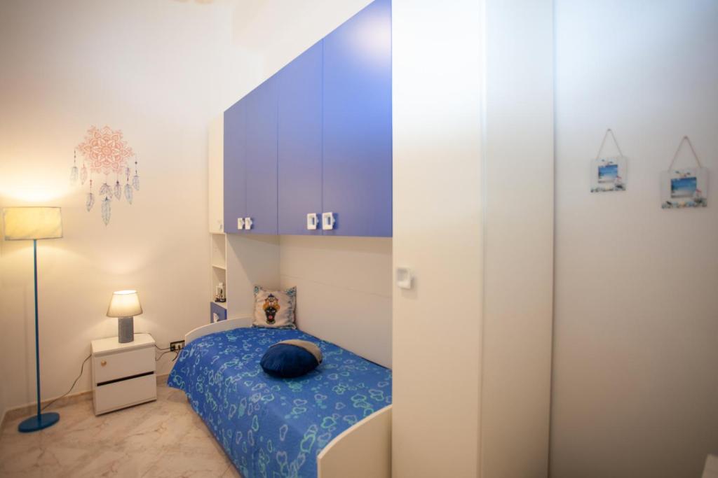 Łóżko lub łóżka w pokoju w obiekcie Casa RosaMaria