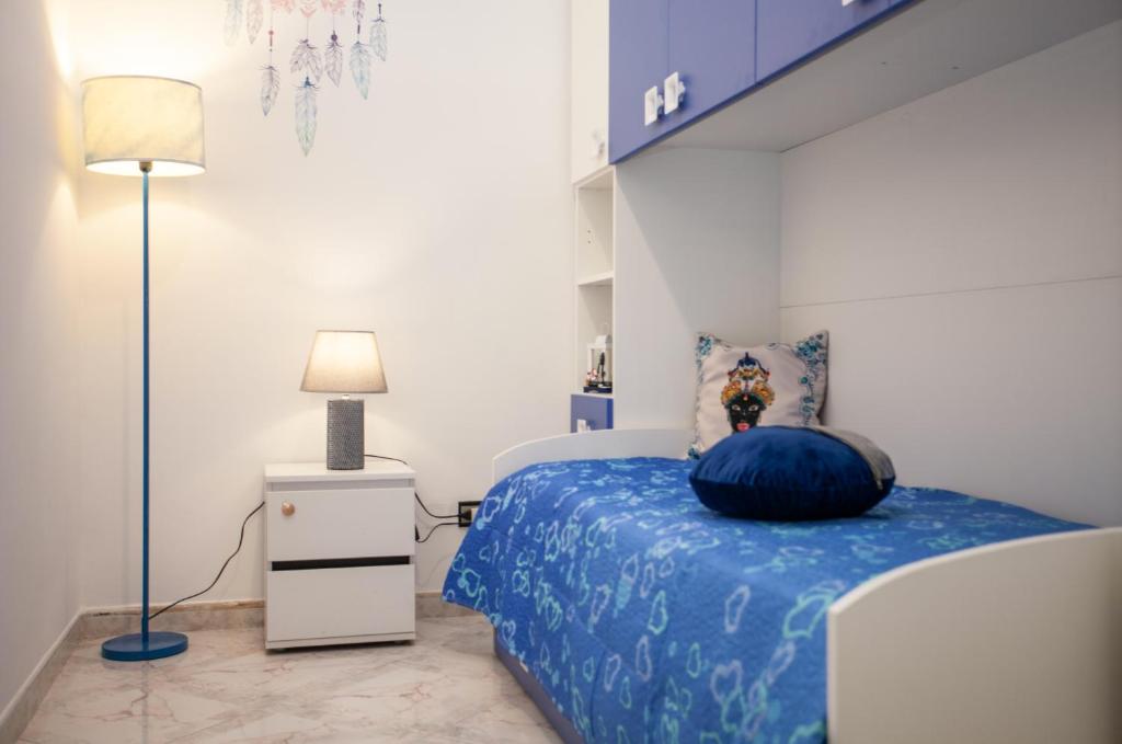 Łóżko lub łóżka w pokoju w obiekcie Casa RosaMaria