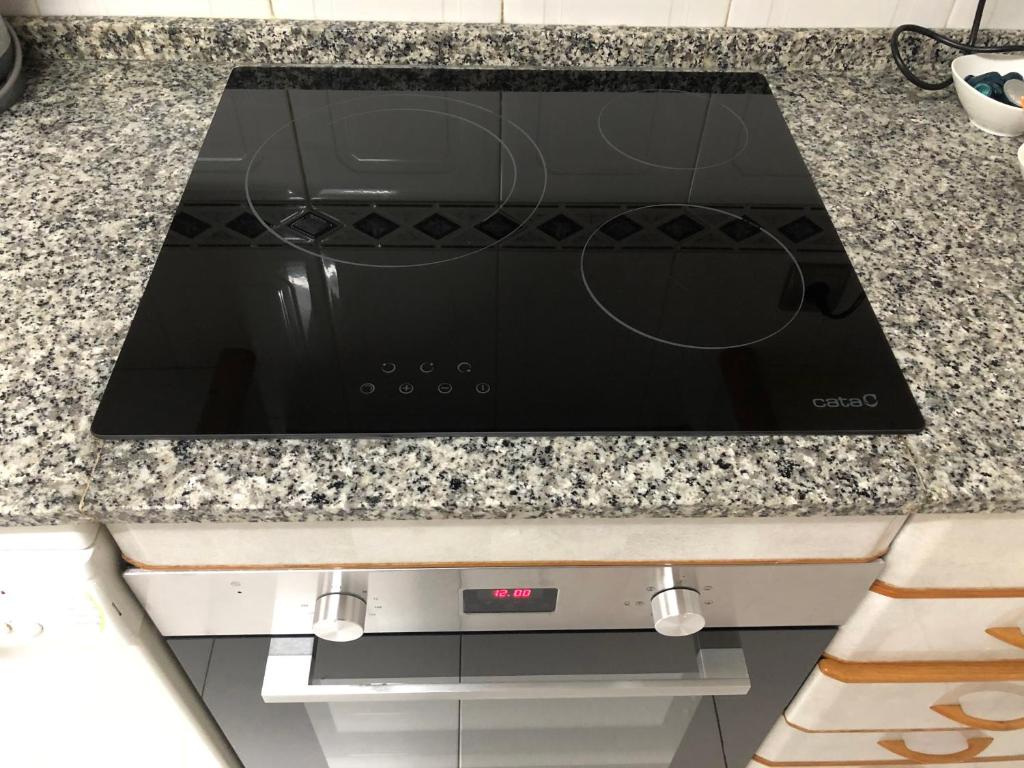 Kuchyňa alebo kuchynka v ubytovaní Apartment Rambla Tarragona Free parking