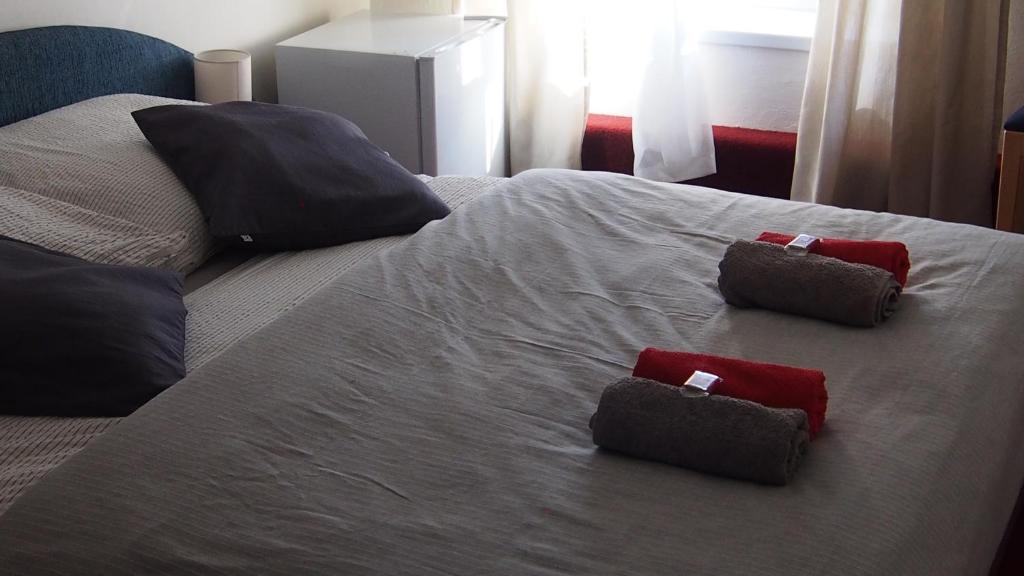 Postel nebo postele na pokoji v ubytování Penzion a Restaurace Na Jízdárně