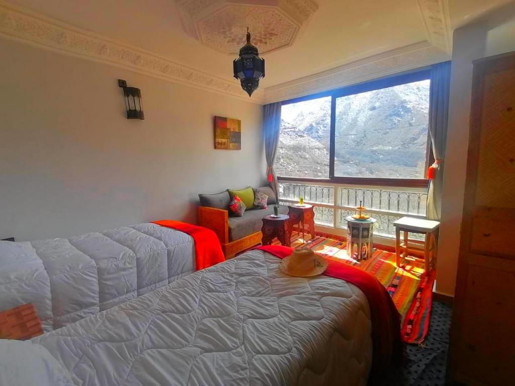 Postel nebo postele na pokoji v ubytování Riad Afla Views