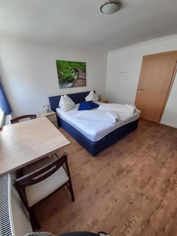 Postel nebo postele na pokoji v ubytování Ferienhaus Kolbnitz