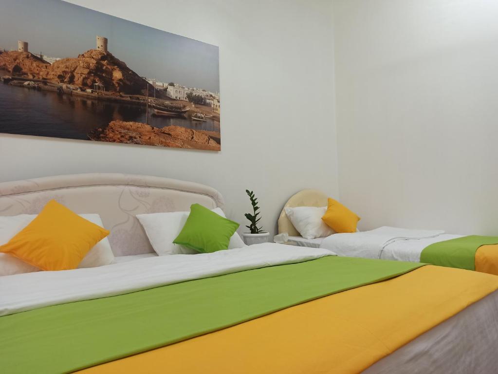 Postel nebo postele na pokoji v ubytování Nima guest house