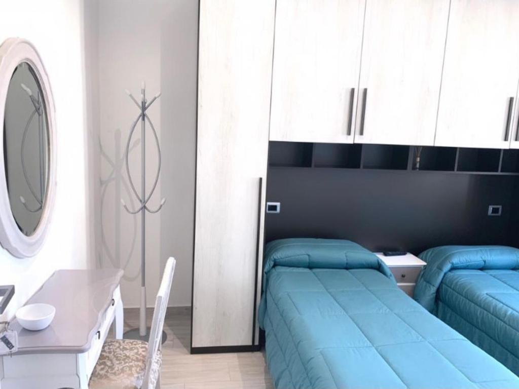 Postel nebo postele na pokoji v ubytování B&B La coccola