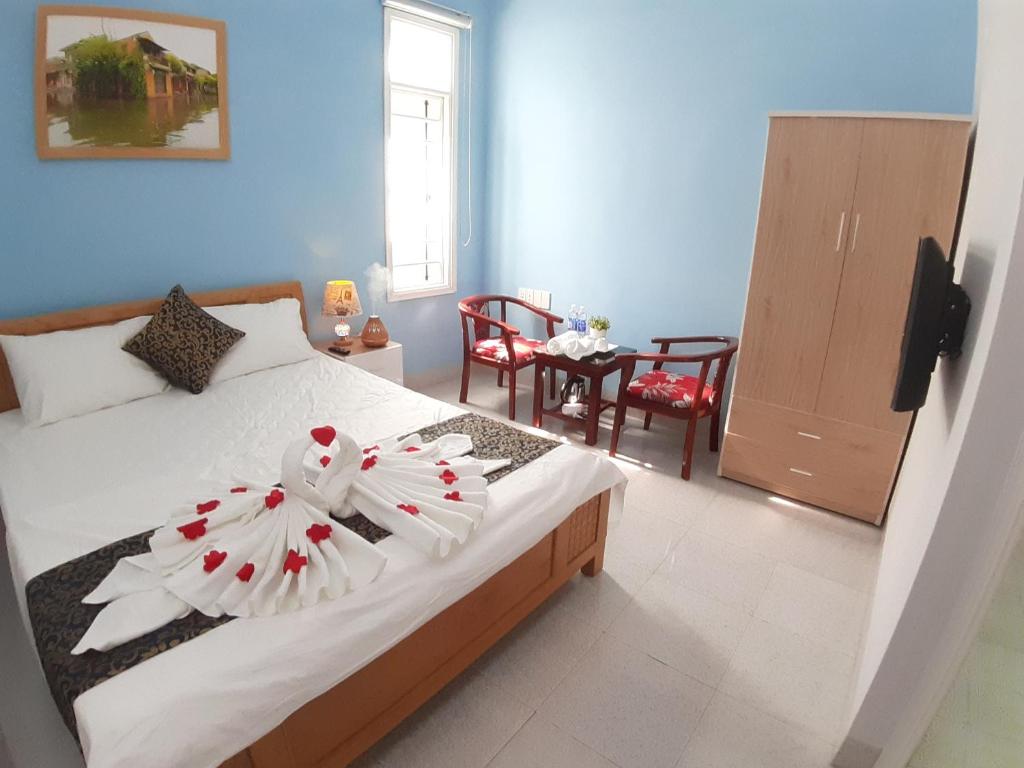 Postel nebo postele na pokoji v ubytování Ngoc Diep Homestay Hoi An
