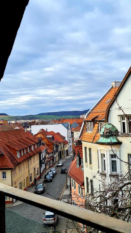a view of a town with buildings and cars at Apartement *Harzblick* in Nordhausen