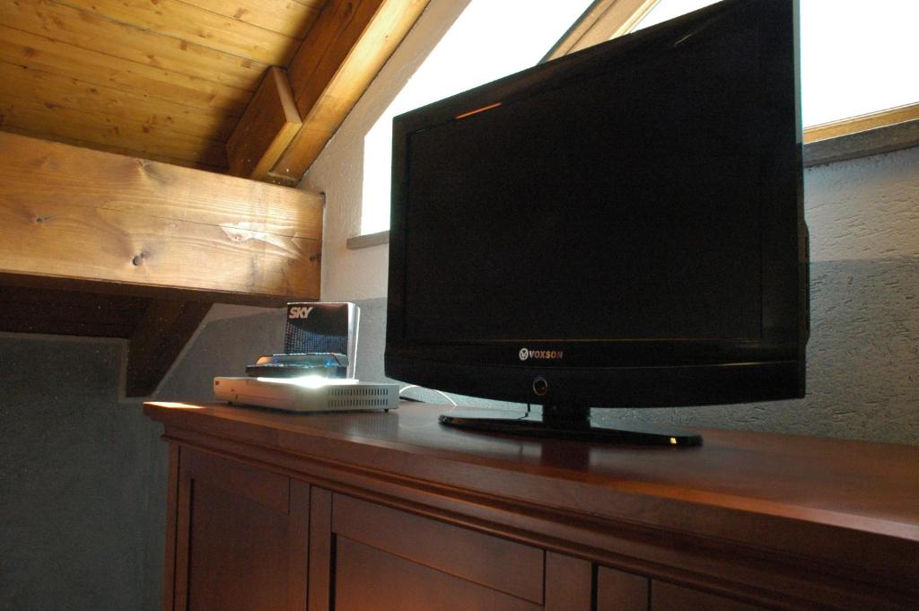 TV a/nebo společenská místnost v ubytování Hotel Clari