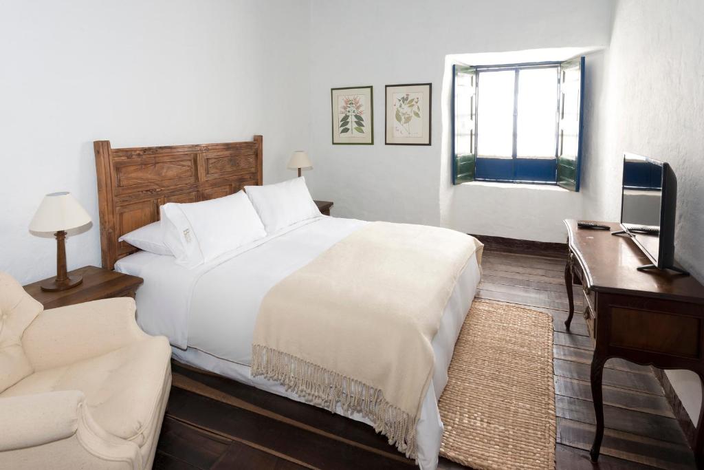 Postel nebo postele na pokoji v ubytování Casa La Bisbal