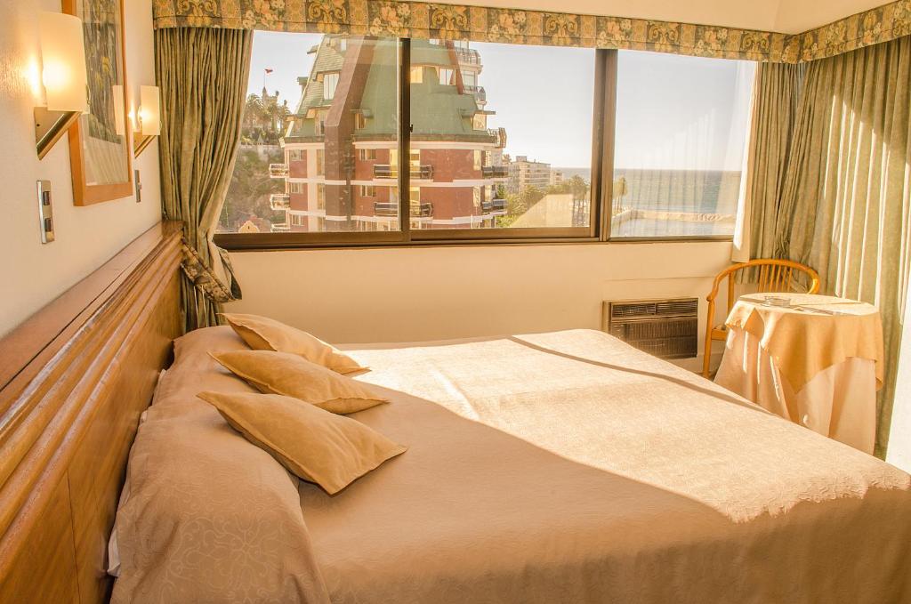 Postel nebo postele na pokoji v ubytování Gala Hotel