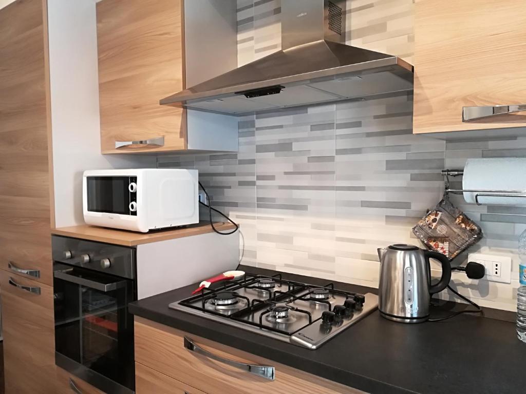 Kuchyňa alebo kuchynka v ubytovaní Feeling Home