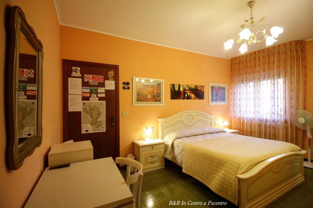 Postel nebo postele na pokoji v ubytování B&B In Centro a Pacentro