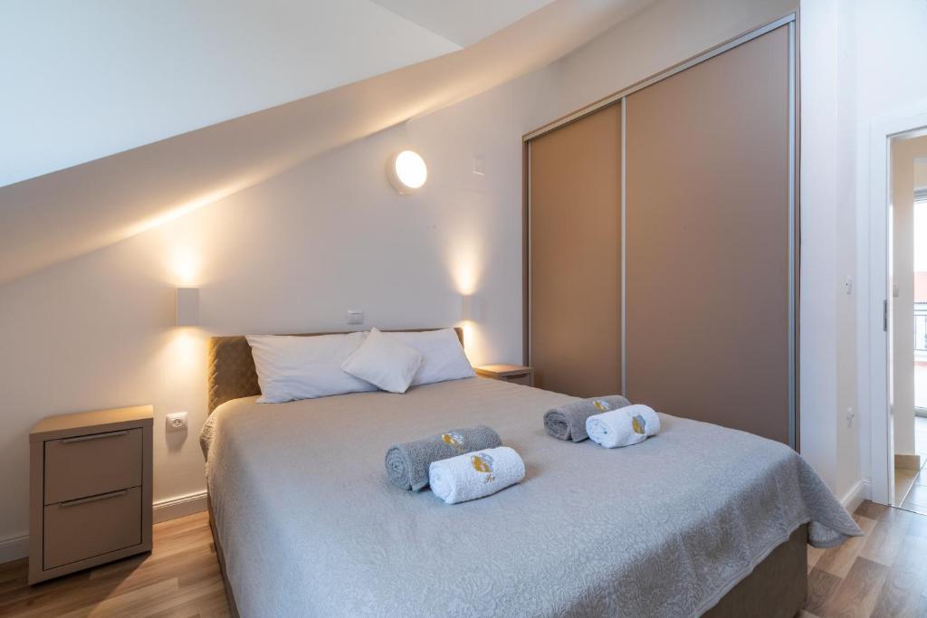 Postel nebo postele na pokoji v ubytování Villa Iva
