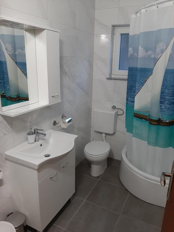Kúpeľňa v ubytovaní Apartments Roby 3M