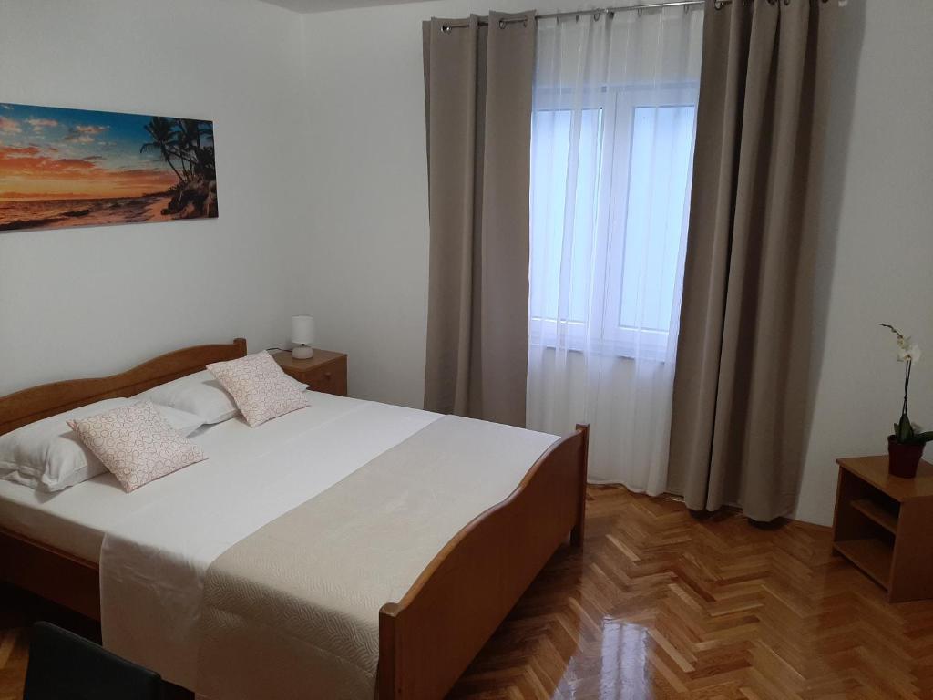 Posteľ alebo postele v izbe v ubytovaní Apartments Roby 3M