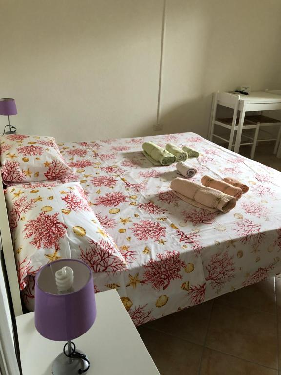Postel nebo postele na pokoji v ubytování Il Ginepro