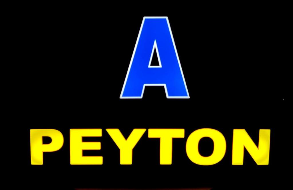 Naktsmītnes Apartmani Peyton logotips vai norāde