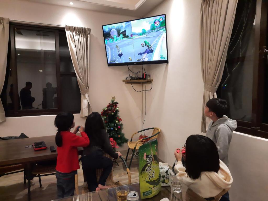 TV a/nebo společenská místnost v ubytování 無盡夏民宿