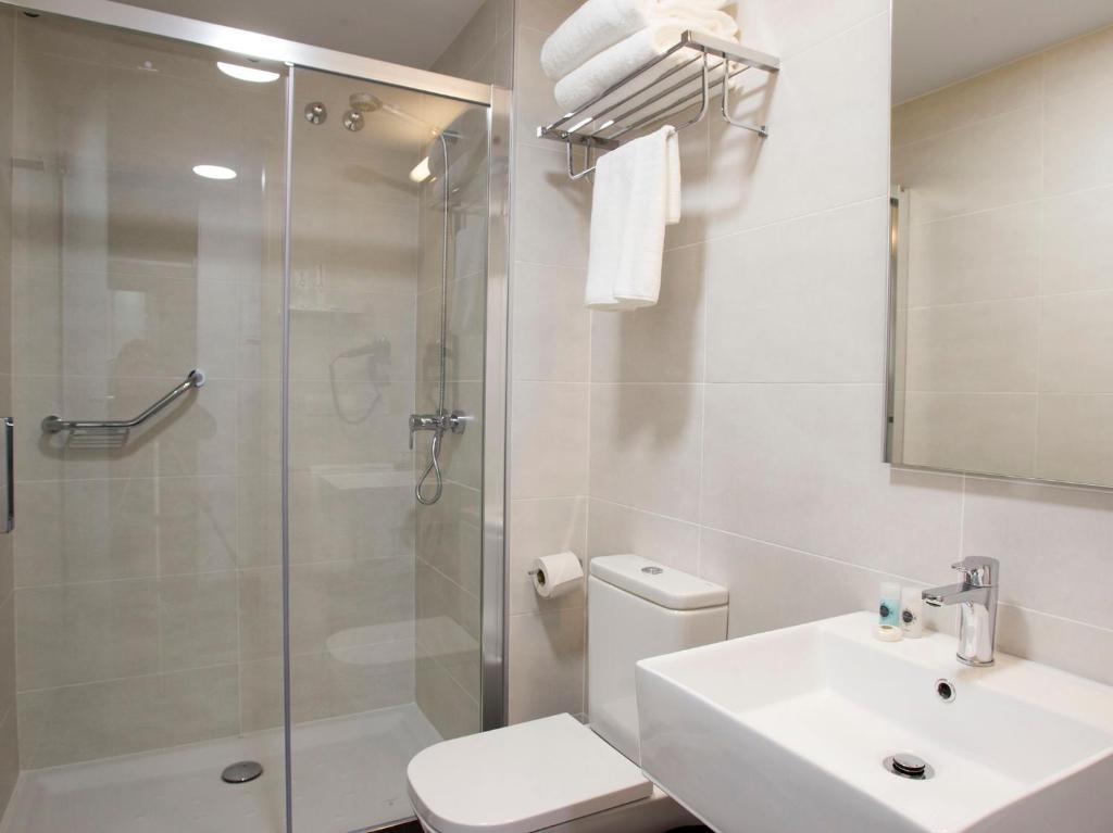 Koupelna v ubytování Hotel Lux Santiago