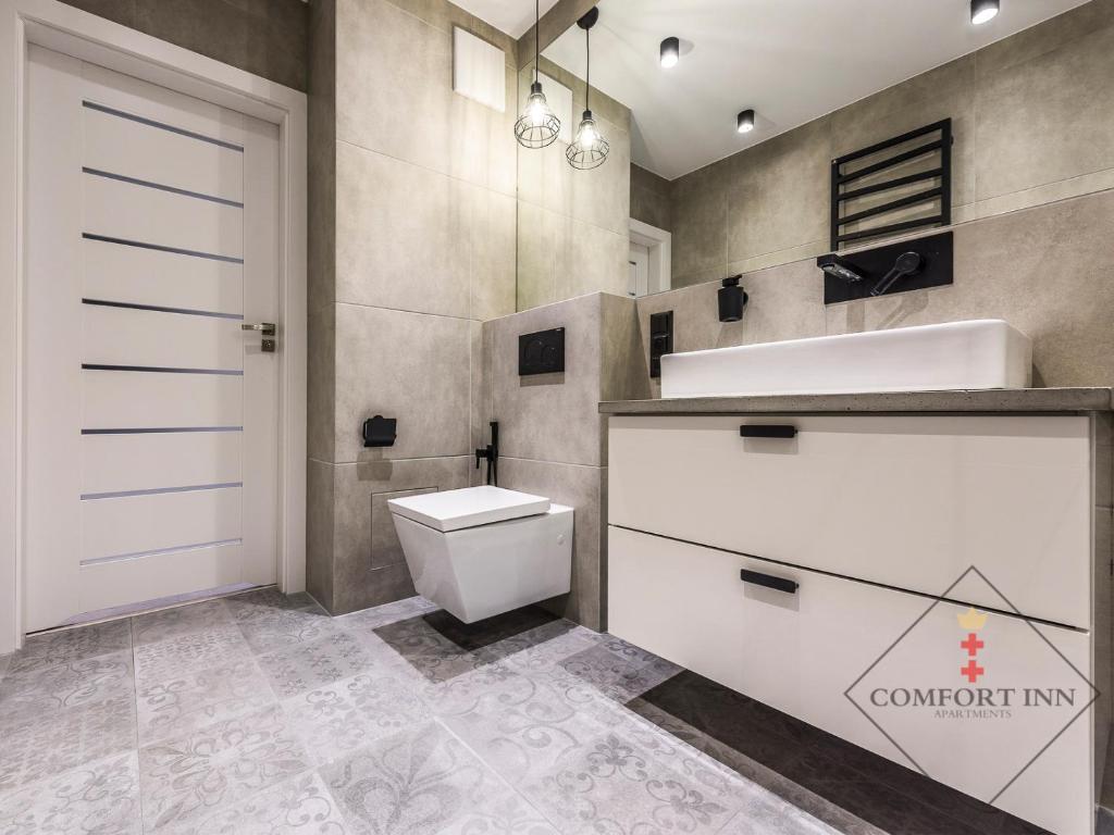 Kúpeľňa v ubytovaní COMFORT INN APARTMENTS - Gdansk, Sadowa