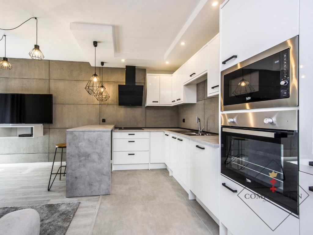 Kuchyňa alebo kuchynka v ubytovaní COMFORT INN APARTMENTS - Gdansk, Sadowa