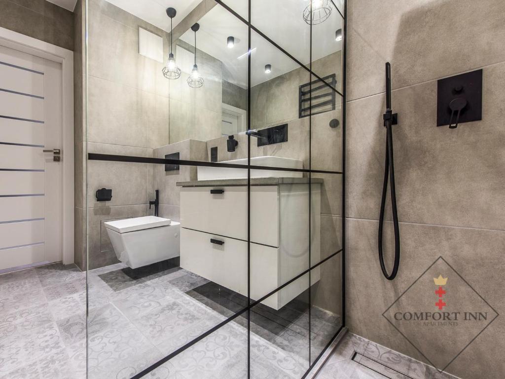 Kúpeľňa v ubytovaní COMFORT INN APARTMENTS - Gdansk, Sadowa