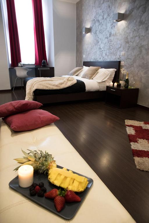 A bed or beds in a room at Chroma Italy - Chroma Pente